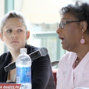 AS Grad student senators Ela Heinz (left) and Donna Randolph (right) are at the Associated Students meeting in the Grand Salon at the USU on Tuesday. Randolph explains why her class schedule conflicts with the hours A.S. senators are required to devote to the senate. Photo Credit: Mariela Molina / Visual Editor