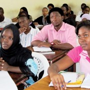 Tanzania Students of the Dar es Salaam School of Journalism in Tanzania listen to Dr. Mitchell speak. Photo Credit: Courtesy of Robert Quiroz