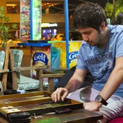 istanbul2 the oldest table-top bThe Turkish game Backgammon is one of oard games, involving both luck and strategy. The board is not just a game or a souvenir from Istanbul. It also helped our traveler meet local people, understand the culture, and bond with the community. Photo Credit: Kat Russel / Daily Sundial