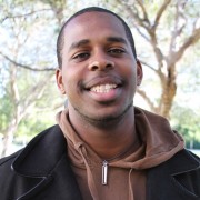 Okonji Martel Okonji, social welfare major and queer studies minor, is part of various LGBT advocate programs. "The thing that drives me the most is smiles," Okonji said. Photo Credit: Tessie Navarro / Visual Editor