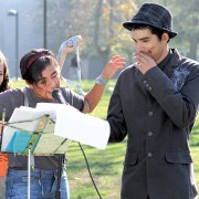 SQE Susana Garcia (center), 18, plays 'Candidate 3' in SQE's mock presidential selection meeting, mimicking a marionette under the control of the Board of Trustees. Photo Credit: Tessie Navarro / Visual Editor