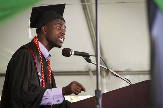 Political science major with a concentration in law and society, Joshua Thompson, gives a speech to CSUN graduates during the black graduation ceremony held at the lawn behind Manzanita Hall, Sunday. Photo credit by Charlie Kaijo/Senior Staff