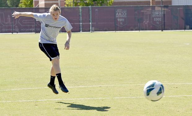 Chris Smith, senior midfielder, takes a shot at goal on the practice field. He has overcome a multitude of injuries over the course of his career at CSUN. Smith has four goals and two assists so far this season. Photo credit: Alex Vejar / Daily Sundial