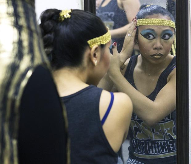 Kristel Dela Rosa, 22, junior kinesology major and member of the CSUN Hip Hop dance team, prepares to go on stage for the 12th Student Showcase in the Plaza Del Sol on Oct. 30, 2013. Photo credit: Trevor Stamp / Daily Sundial