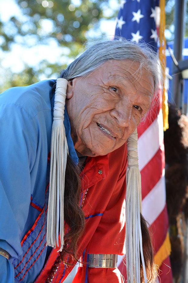 Saginaw Grant, head gourd dancer, blessed the powwow arena and it’s dancers as well as lead attendees in prayer multiple times throughout the gathering. Photo credit: John Saringo-Rodriguez / Photo Editor