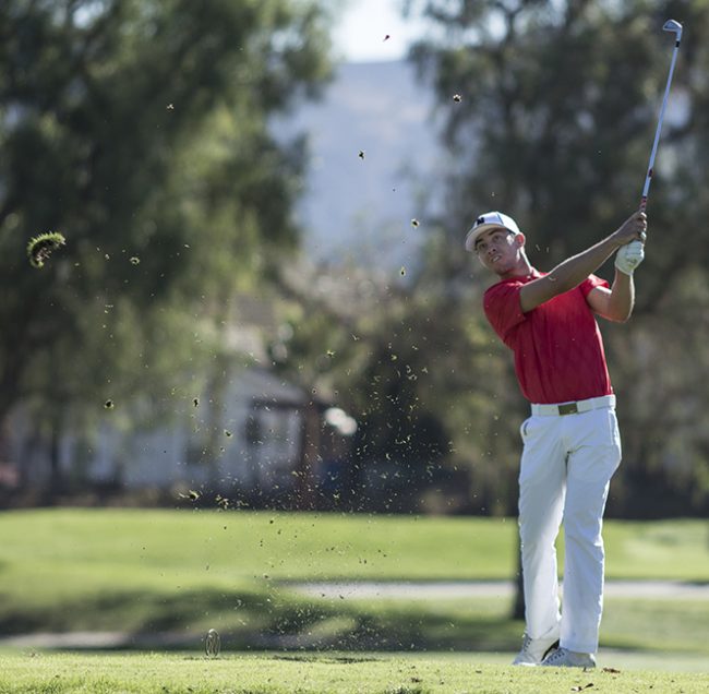 Senior Aden Louz teeing off during the Bill Cullum Invitation at Wood Ranch Golf Club in I Simi Valley on Oct. 21, 2014. Photo Credit: Trevor Stamp/ Senior Photographer