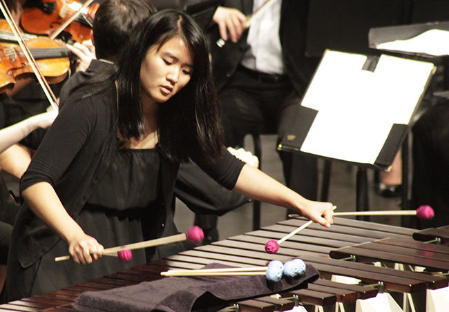 Percussionist Jieun Chung performs one of two solos during the "Concerto for Marimba and Strings" portion of the Oct. 1 concert. Photo Credit: Luis Garcia/ Contributor