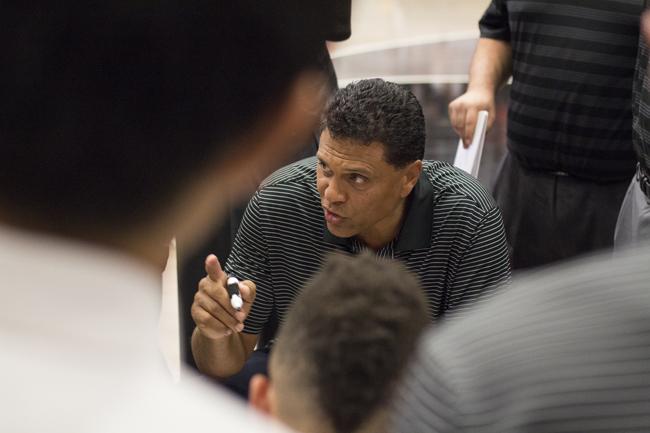 Entering his second year as head coach, Reggie Theus' experience as a NBA player and coach make him the ideal source for men's basketball players, on and off the court. Photo credit: Trevor Stamp/Senior Photographer