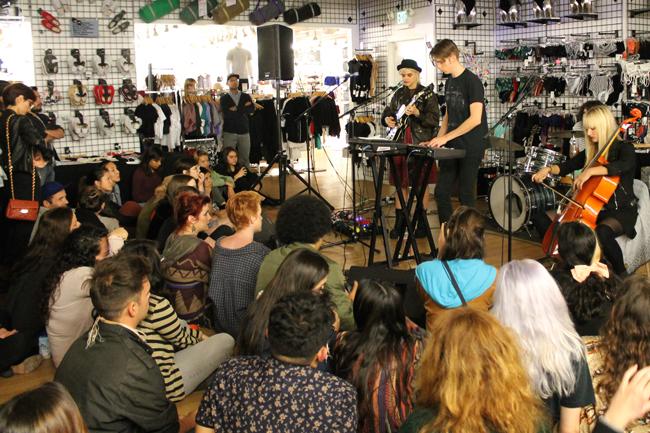 Soko performing to an intimate, young, eclectic audience at American Apparel on Melrose. "I feel like they only sent the invite to really hot people tonight, like they had a casting for my audience," said Soko. Photo Credit: Demi Corso/The Sundial