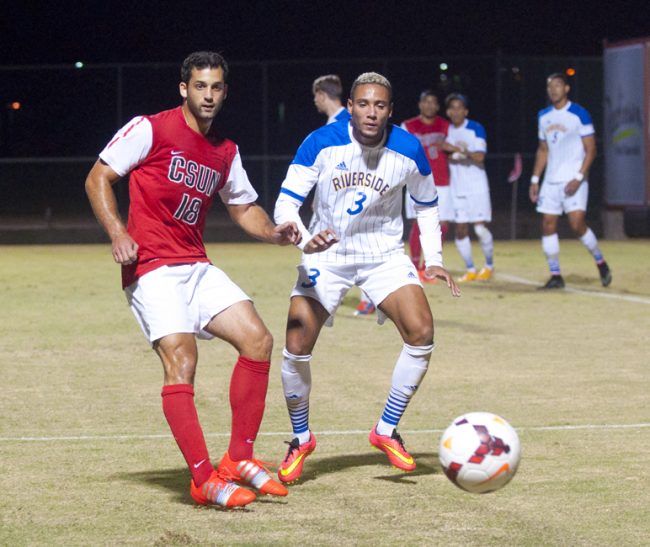 Matadors Sagi Lev-Ari, left, and Otis Earle, right, battles for the ball during the first half on Saturday, Oct. 18, 2014 at the Matador Soccer Field in Northridge, Calif. The Matadors defeat the UC Riverside Highlanders with a score of 2-1 advancing them to third place in the Big West South Division. Photo Credit: David J. Hawkins/The Sundial