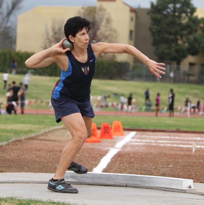 Linda Cohn, 62, a National Masters Champion competes in the shot put at the All Comers meet on Feb. 7, 2015.