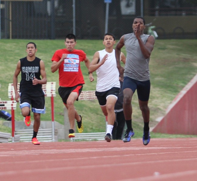 Arshaad Rahh, 21, a CSUN Junior (far right, grey shirt) winning the 400 meter at the All Comers meet on Feb. 7, 2015.