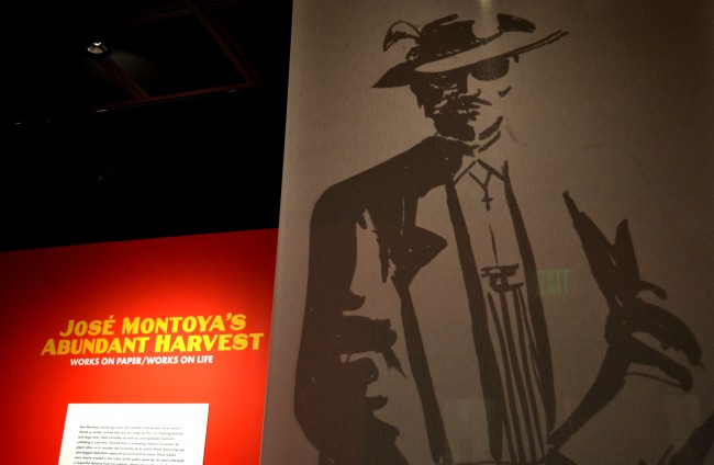 The exhibition's name stands to the side of a large-scaled version of one of Montoya's various Pachuco drawings. (Natalie Jimenez /The Sundial)