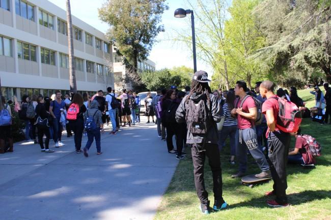 Students wait on Matador Walk after a fire alarm was allegedly pulled Photo credit: James Fike