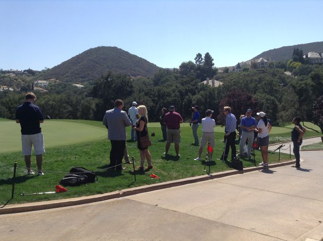 Member of the media gather around at the golf course at the Sherwood Country Club. Photo Credit: Sundial Evelyn Hernandez 