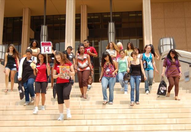 Incoming freshmen students come down the stairs of the Oviatt Library as they tour CSUN as part of their orientation on August 13, 2009. Photo Credit: Camille Hislop / Staff Photographer