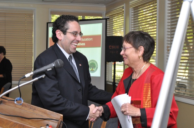 Juan Sepulveda, executive director of the White House Initiative on Educational Excellence for Hispanic Americans, greets President Jolene Koester at the Orange Grove Bistro, Wednesday, Aug. 19, 2009. Photo Credit: Jonathan Pobre / Executive Editor