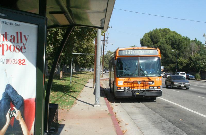 The Metro Local line 166 bus picks up passengers at the corner of Nordhoff Street and Lindley Avenue. Photo Credit: Charlie Landon / Staff Photographer