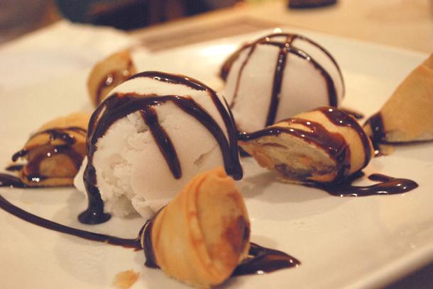 Rincome Restaurant serves deep fried banana with coconut ice cream as one of their dessert items. Photo Credit: Aprile Sumague / Staff Reporter
