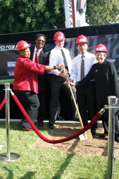 Member of the University Student Union and CSUN President Jolene Koester posed as they "broke ground" for the construction of the new student Recreation Center. Zara AleksanYan / staff photographer