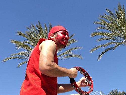 Sophomore business management major Sahand Reiisieh, 19, dances at CSUNs Persian New Year celebration. Red represents fire, joy -- the cleansing of the spirit for the new year, he said. Im a promoter of fun an excitement for the new year to come. Photo Credit: Elano Pizzicarola