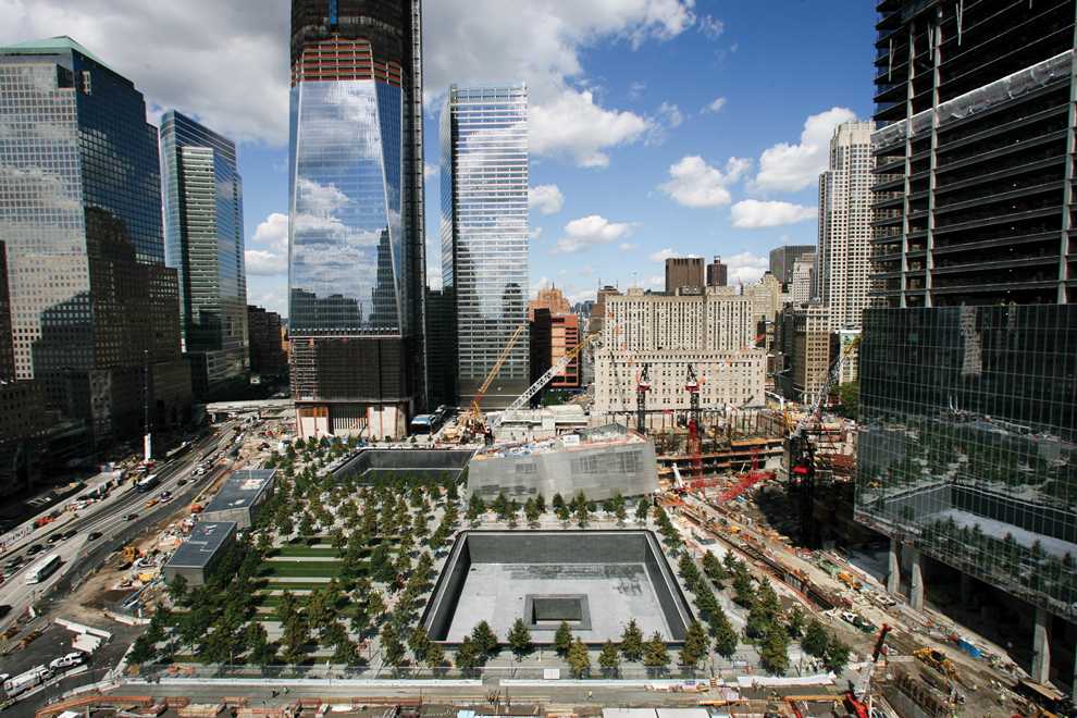 Seen from the south side is the World Trade Center, with the 9/11 Memorial situated around the footprints of the original towers. Photo Credit: Courtesy of MCT