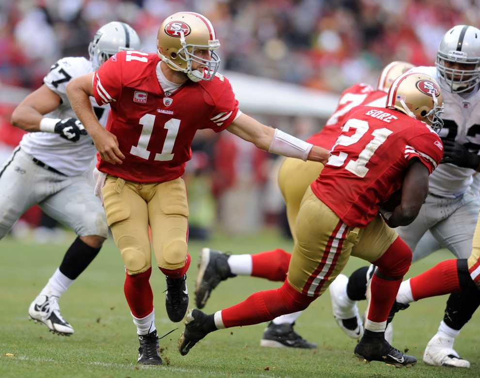 Behind the one-two punch of Alex Smith (11) and Frank Gore (21), the 5-1 49ers are a surprise team in the NFL.  Photo Credit: Courtesy of MCT