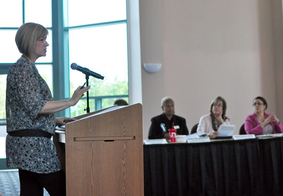 Associate Director of Marketing and Programs, Shannon Krajewski reviews details of the anticipated Student Recreation Center during the Board of Directors Meeting yesterday. Photo Credit: Katie Grayot / Daily Sundial