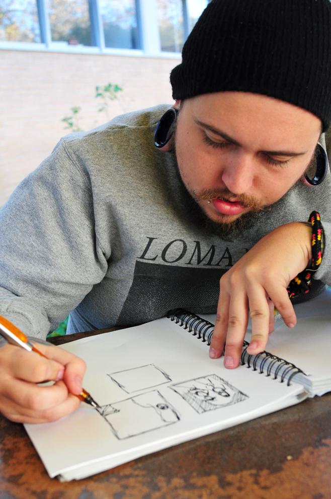 Alex Johnson, 23, Art major with emphasis in Illustration, is hopeful about the prospective job opportunities available to him in his field. Photo Credit: Karlee Johnson / Daily Sundial