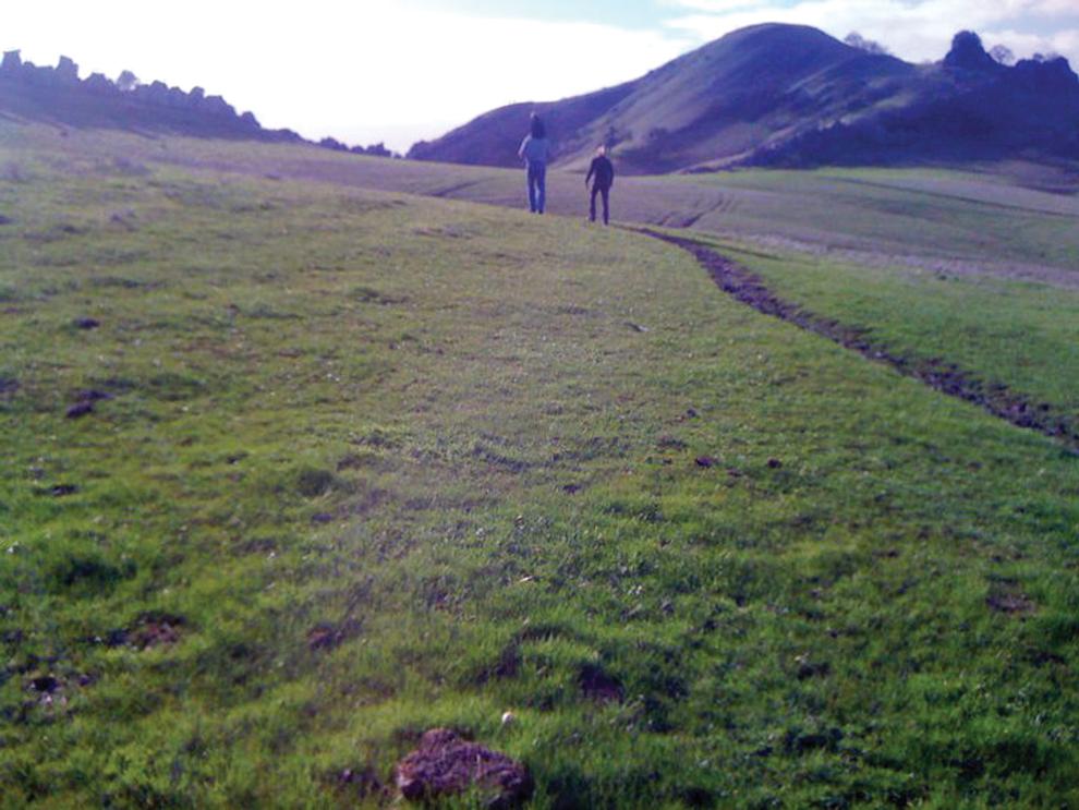 A family hikes towards an exposed dike at Mount Diablo State Park. Photo Credit: Kristin Hugo / Opinion Editor