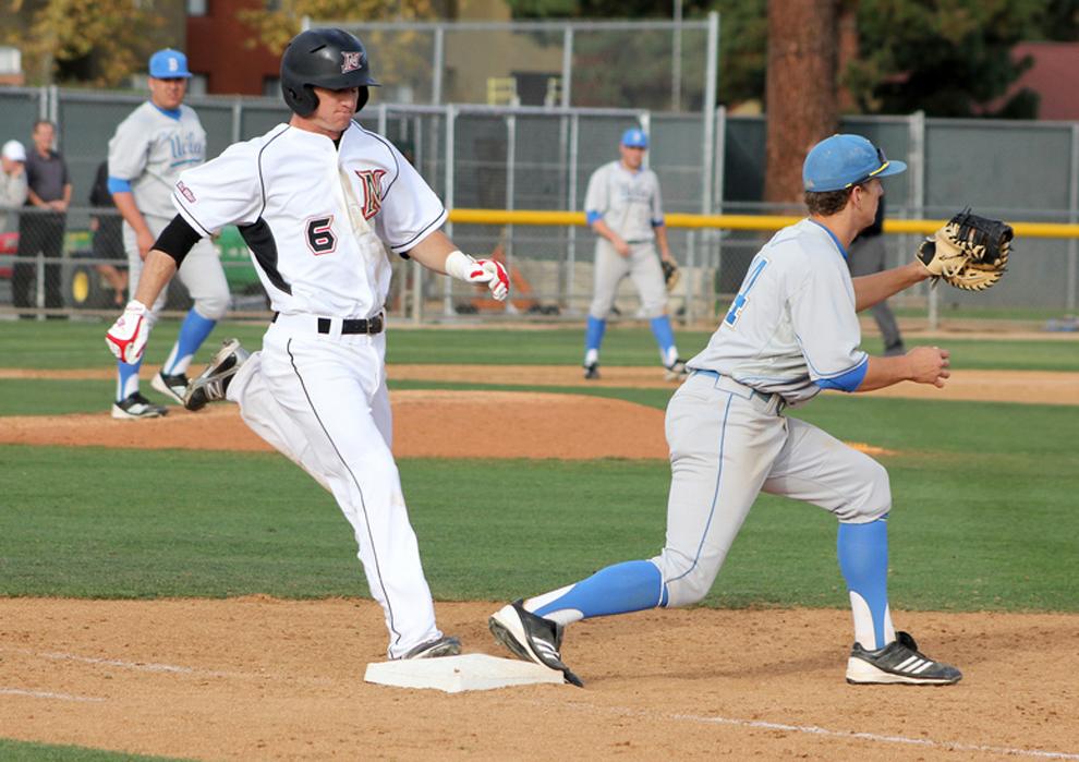 CSUN+infielder+Kyle+Attl+%286%29+gets+on+base+against+UCLA+Tuesday+afternoon.++The+Matadors+lost+their+home+opener+19-7.+Photo+Credit%3A+Michael+Cheng+%2F+Daily+Sundial