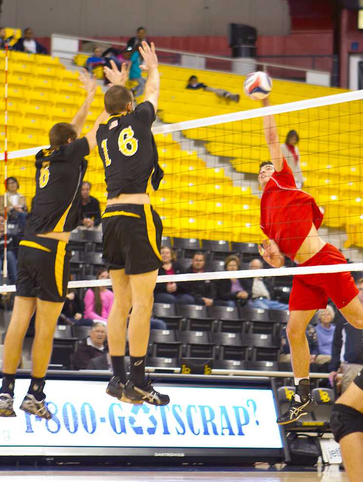Julius Höefer puts down a kill against LBSU last Friday. Höefer and the Matadors host two games this weekend: against Pacific and Stanford. Photo Credit: Kat Russell / Senior Photographer