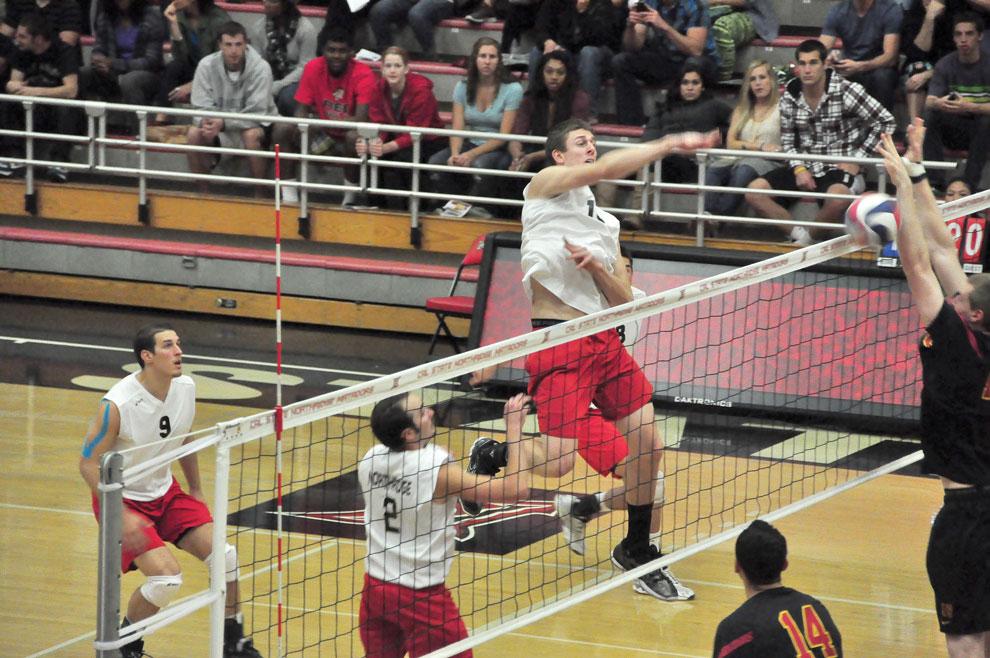 CSUN middle blocker Jared Moore goes for a kill against USC during the Matadors’ last regular-season game Saturday at the Matadome. CSUN will pay the Trojans a visit this Saturday for a MPSF playoff game. Photo Credit: Mariela Molina / Photo Editor