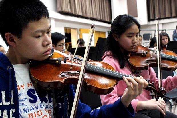 Bruce Tiu, 16, plays violin and is a junior at Chaminade High School.