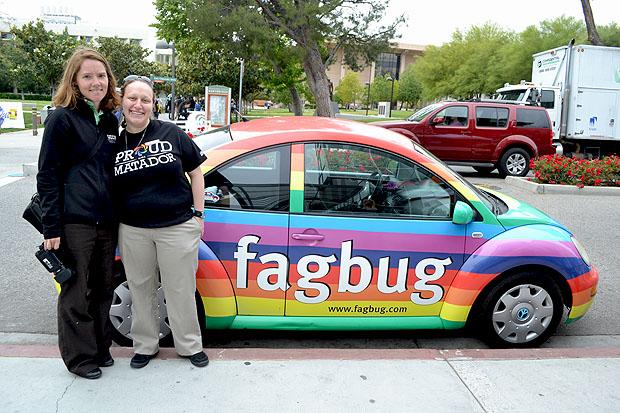 Erin Davies, Fagbug owner and LGBTQ activist, and Sarina Loeb, USU Pride Center and LGBTQ Initiatives Coordinator and organizer of the Fagbug event, stand beside the Fagbug, which has over traveled 250,000 miles across the U.S. to bring about awareness on LGBTQ issues. Photo Credit: John Saringo-Rodriguez / Daily Sundial