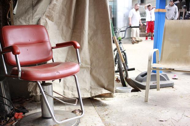 Romo first started cutting hair in the backyard of his family's home six years ago in a makeshift barber shop covered with a canopy. One of his first big purchases while he began cutting hair was this red barber chair.