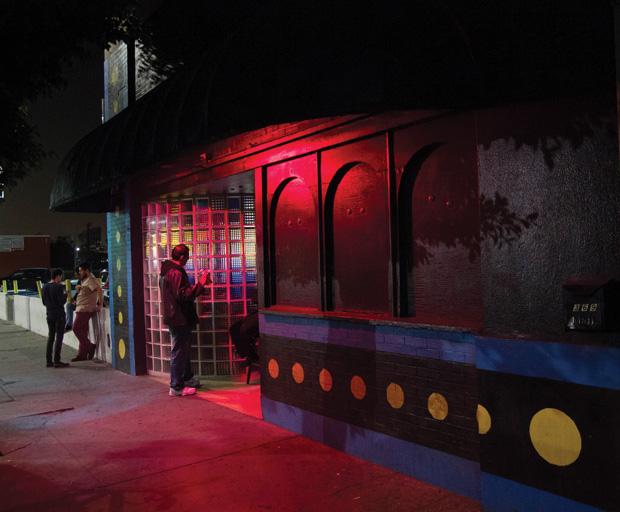 The exterior of Blipsy Barcade, on Western Ave. in Korea Town, is unusually nondescript, especially in the day time. A row of Pac-Dots line the brick wall giving away what awaits inside. The day-glo pink light mimics the interior arcade machine's color cascade from rows of stand-up cabinets. 