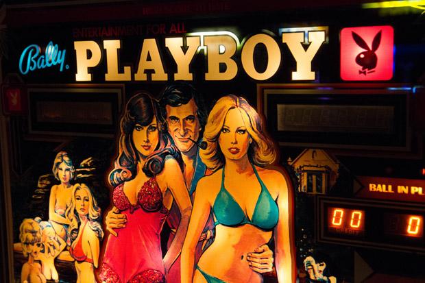 The glass marquises of both pinball and cabinet games were the main advertising for getting your quarters. They were often bright and colorful and even more often just plain gaudy. Playboy is a brand that draws attention and many pinball machines were products of popular licenses to get you to play.