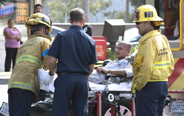 A male suspect is loaded into an ambulance after a police chase ended on Nordhoff Street and Darby Avenue. Photo credit: Trevor Stamp / Daily Sundial
