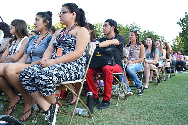 Freshmen wait for the Freshman Convocation to begin. The event took place on Thursday, Sept. 12 at 5 p.m. on the Oviatt lawn.  Photo credit: John Saringo-Rodriguez / Photo Editor