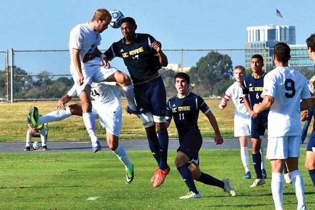 Redshirt junior defender Tanner Snedigar heads the ball with an Anteater defender nearby. UC Irvine has now won the Big West title two out of the last three years. Photo credit: Ken Scarboro / Senior Photographer