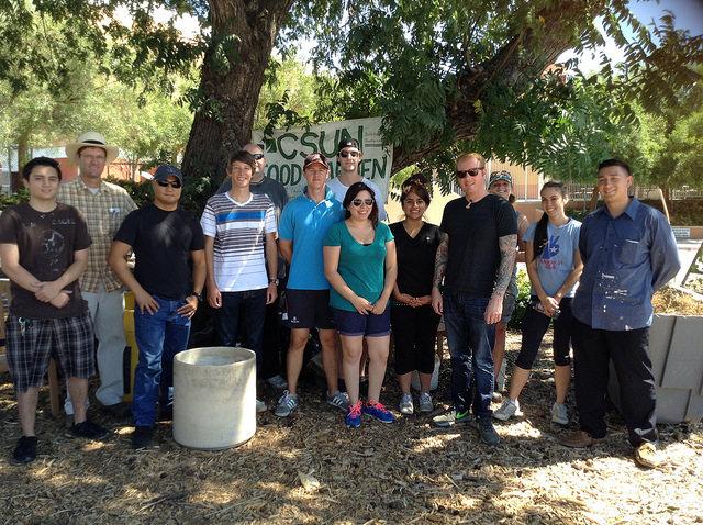 Dr. Mario Giraldo and his Geography 404 class work in the garden which contains peppers, pumpkins and rare plants like Peruvian native plant and Amaranthus. 
Photo Credit: Leah Arzu / Sundial Staff