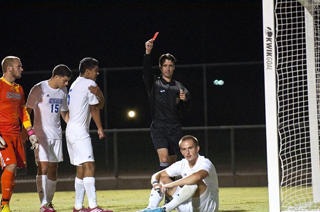 Simon Doherty, center receives the second yellow card resulting a red card forcing him to be ejected from the game. The Matadors win a 2-1 victory over the Roadrunners after enduring a double overtime game ending at the 104th minute mark. Photo Credit: David J. Hawkins/ The Sundial