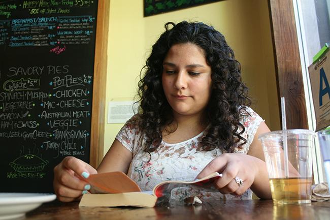 When Mayra Roxi Diaz, 24, graduate student, does not study or work, she is spends her time at her favorite coffee shop, Republic of Pie, in North Hollywood reading a book. Photo Credit: Rasta Ghafouri/ The Sundial