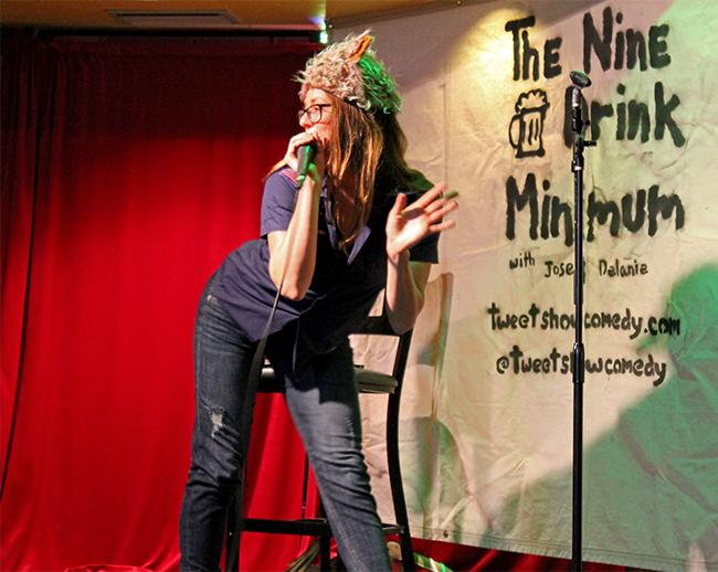 Comedian Dana Moon, performs her skit dressed as a boy scout for The Halloween Nine Drink Minimum show on Oct. 30. The Nine Drink Minimum is a local comedy show in Northridge that features different comedians each week. Photo Credit: Demi Corso/ The Sundial