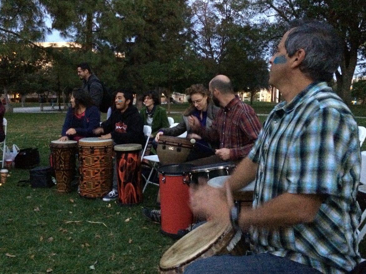 Students participate in a drum circle on the Bayramian Hall Lawn at CSUN on Monday, Nov. 17, 2014. Photo credit: Melissa Fumbark/The Sundial.