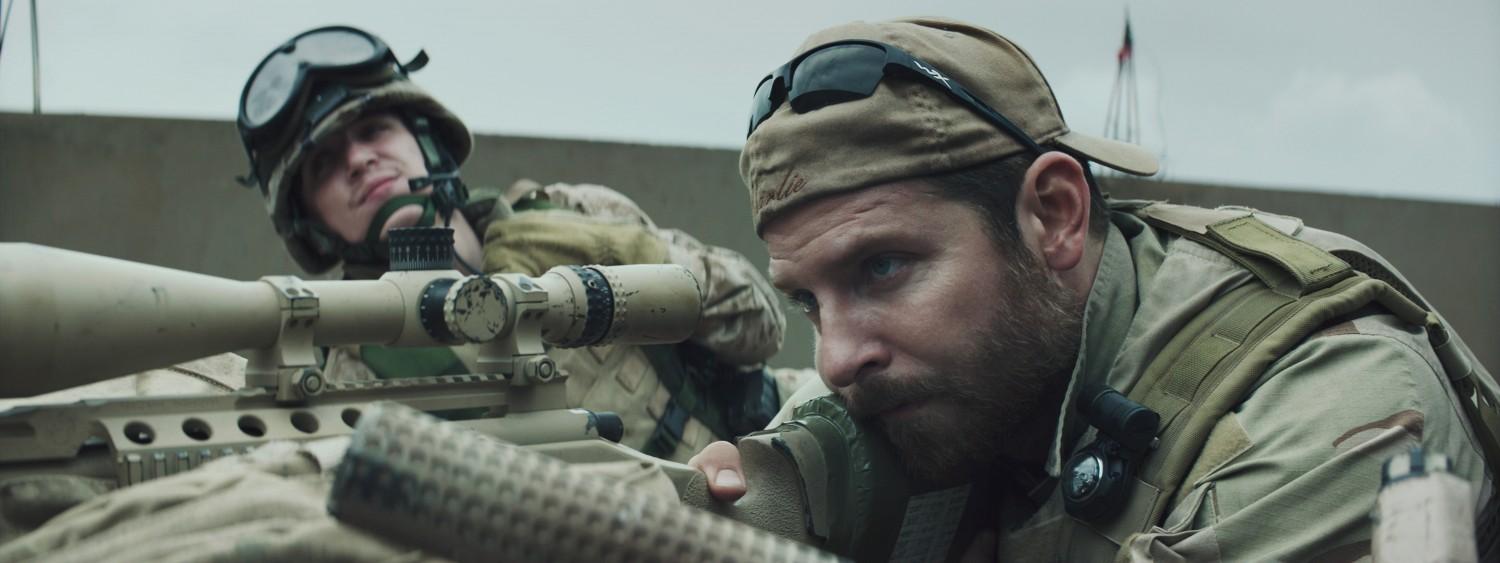 Kyle Gallner, left, as Goat-Winston and Bradley Cooper as Chris Kyle in Warner Bros. Pictures' and Village Roadshow Pictures' drama 