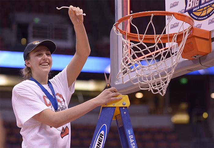 Camille Mahlknecht and the CSUN Matadors celebrate thier back-to-back title in the Big West Conference by cutting the net  after deefeating Hawaii by a final score of 67-60 at the Honda Center on March 14 (Raul Martinez/ Staff Photographer)
