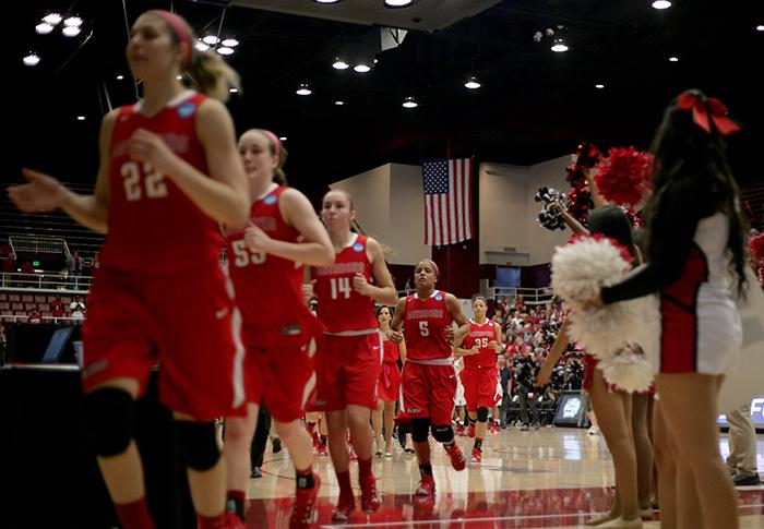 Senior Ashlee Guay and her Matadors team walk off the court for the final time after their loss to Stanford by a final score of 73-60 in the first round of the Womens NCAA tournament on March 21 in Stanford. (Raul Martinez/ Staff Photographer)