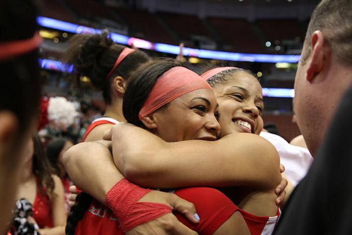 Seniors Janae Sharpe (left) and Ashlee Guay embrace after the Matadors win the Big West Championship for a second year in a row on March 14. (Trevor Stamp / Multimedia Editor)